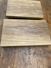 Small presentation board made from one piece of oak. Small beech feet. Oiled. MINIBOARD