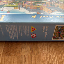 Ravensburger 1000 piece Jigsaw puzzle - "By The Canal". Checked