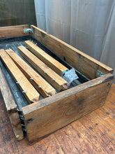 Patio plant stand made with reclaimed oak and complete with a grow bag tray. Oiled. 3591 9957 or 9958