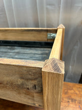 Patio plant stand made with reclaimed oak and complete with a grow bag tray. Oiled. 3591 9957 or 9958