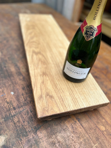 Large serving board made from one piece of oak with short hardwood feet. Oiled. BOARD3 or BOARD4