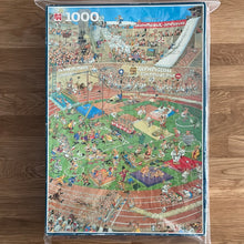 Jumbo 1000 piece jigsaw puzzle. "Olympics" by Jan Van Haasteren - checked