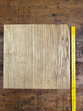 Small presentation board made from one piece of oak. Small beech feet. Oiled. MINIBOARD