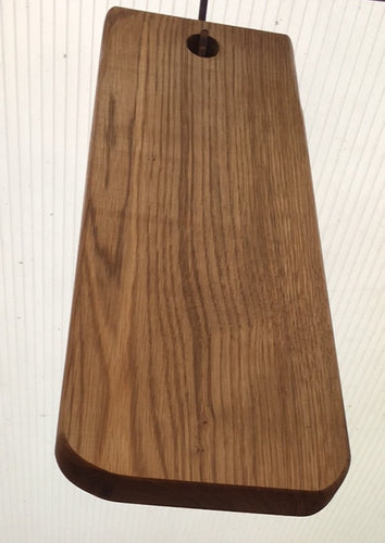 Chopping board made from one piece reclaimed oak in the style of a paddle. Oiled. 4363 7079