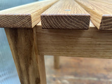 Solid oak stool or table with slatted top and detachable legs. Oiled. 0682 7095