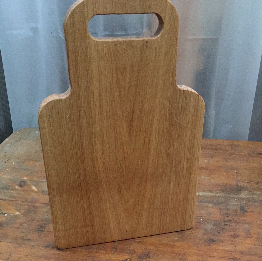 Wide oak chopping board with a 